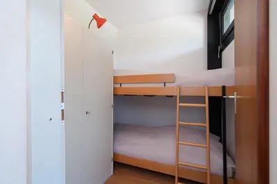 Ein Etagenbett oder Etagenbetten in einem Zimmer der Unterkunft Ferienpark Sierksdorf App 165