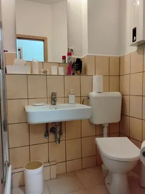 Ein Badezimmer in der Unterkunft Ferienwohnung am Bahnhof Meierstr 43