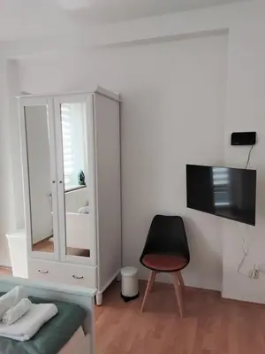 Ein Bett oder Betten in einem Zimmer der Unterkunft Ferienwohnung am Bahnhof Meierstr 43