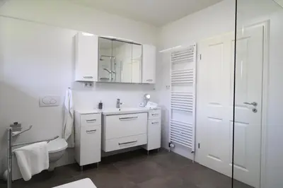 Ein Badezimmer in der Unterkunft Küstenglück