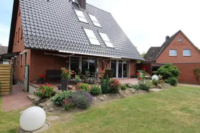Ein Garten an der Unterkunft Küstenglück