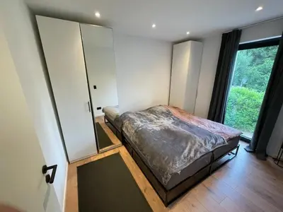 Ein Bett oder Betten in einem Zimmer der Unterkunft Modernes Apartment - zentral - nahe Hamburg & Lübeck