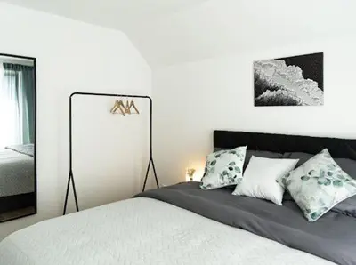 Ein Bett oder Betten in einem Zimmer der Unterkunft Flussblick am Töpferberg 7