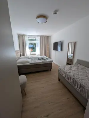 Ein Bett oder Betten in einem Zimmer der Unterkunft Serendipity