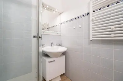 Ein Badezimmer in der Unterkunft Ginys Meerblick Appartement
