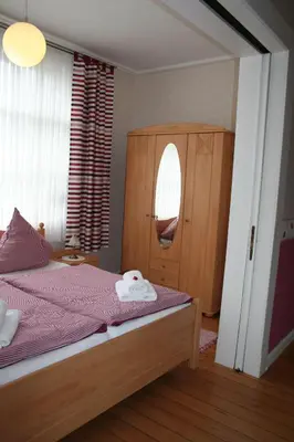 Ein Bett oder Betten in einem Zimmer der Unterkunft Ferienwohnung Bracke Fischermanns Stuv