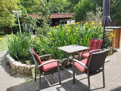 Ein Garten an der Unterkunft Ferienwohnung Bracke Fischermanns Stuv