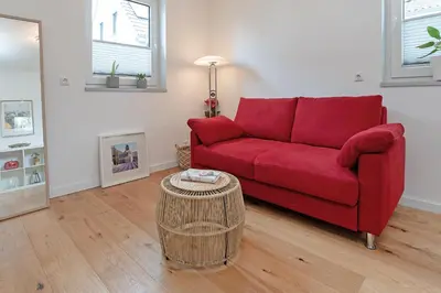 Ein Sitzbereich in der Unterkunft Achtern Hoff