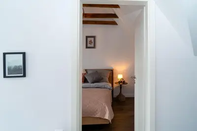 Ein Bett oder Betten in einem Zimmer der Unterkunft Dat Krautacker Huus
