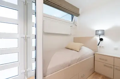 Ein Bett oder Betten in einem Zimmer der Unterkunft Ferienpark Sierksdorf App 101