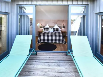 Ein Sitzbereich in der Unterkunft Schöne Aussicht Rosenhagen Haus 3