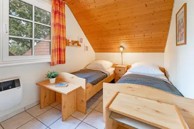 Ein Bett oder Betten in einem Zimmer der Unterkunft Ferienparadies Seeweg 16