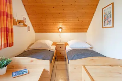Ein Bett oder Betten in einem Zimmer der Unterkunft Ferienparadies Seeweg 16