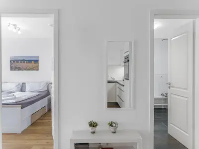 Ein Bett oder Betten in einem Zimmer der Unterkunft Objekt-Nr 234 - Priwall - Mecklenburger Landstraße