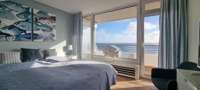 Ein Bett oder Betten in einem Zimmer der Unterkunft Himmel & Meer Suite