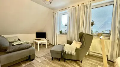 Ein Sitzbereich in der Unterkunft Ferienwohnung Heimathafen