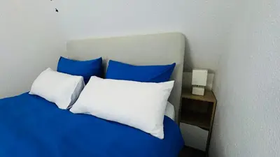 Ein Bett oder Betten in einem Zimmer der Unterkunft Ferienwohnung Heimathafen