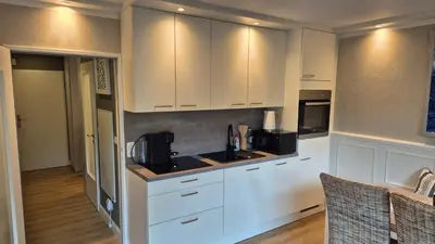 Küche/Küchenzeile in der Unterkunft Beach & Breeze Ferienwohnung mit Terrasse Scharbeutz