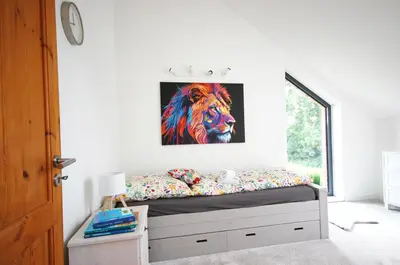 Ein Bett oder Betten in einem Zimmer der Unterkunft Ferienhaus mit Blick über die Felder und Golfplatz