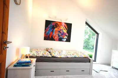 Ein Bett oder Betten in einem Zimmer der Unterkunft Ferienhaus mit Blick über die Felder und Golfplatz