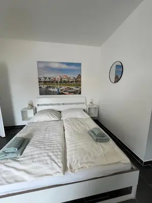Ein Bett oder Betten in einem Zimmer der Unterkunft Segellast 3