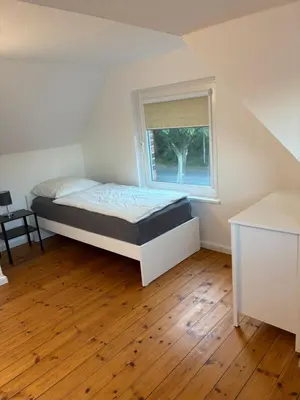 Ein Bett oder Betten in einem Zimmer der Unterkunft Haus für Handwerker und Monteure