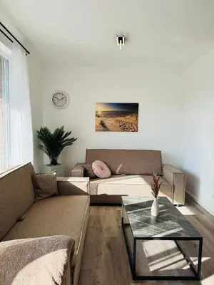 Ein Sitzbereich in der Unterkunft Familientraum 10min zur Ostsee und nach Lübeck Zentrum mit Parkplatz & Balkon