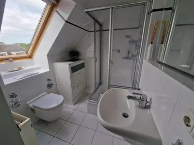 Ein Badezimmer in der Unterkunft PEMATRA FeWo Windrose