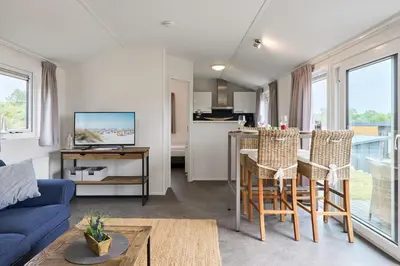 Küche/Küchenzeile in der Unterkunft Süsel Seeparx Ferienhaus Seeleuchten