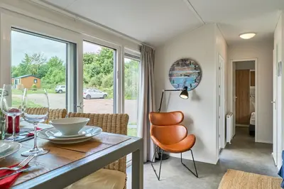Ein Sitzbereich in der Unterkunft Süsel Seeparx Ferienhaus Se e hnsucht