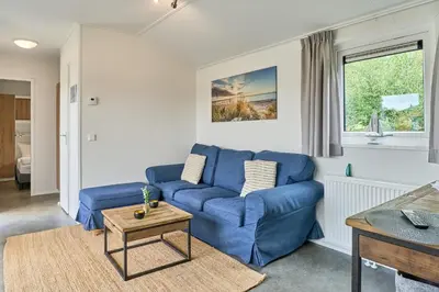 Ein Sitzbereich in der Unterkunft Süsel Seeparx Ferienhaus Se e hnsucht