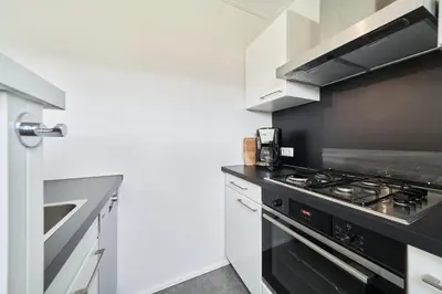 Küche/Küchenzeile in der Unterkunft Süsel Seeparx Ferienhaus Seeliebe