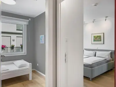Ein Bett oder Betten in einem Zimmer der Unterkunft Objekt-Nr 196 - Priwall - Fliegerweg