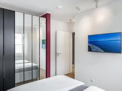 Ein Bett oder Betten in einem Zimmer der Unterkunft Objekt-Nr 196 - Priwall - Fliegerweg