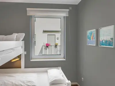 Ein Bett oder Betten in einem Zimmer der Unterkunft Objekt-Nr 196 - Priwall - Fliegerweg