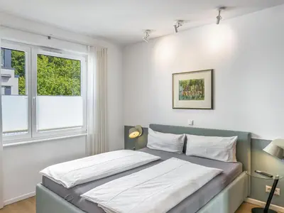 Ein Bett oder Betten in einem Zimmer der Unterkunft Objekt-Nr 196 - Priwall - Fliegerweg