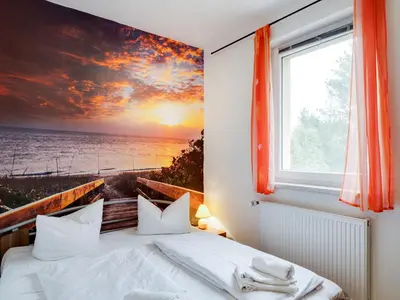 Ein Bett oder Betten in einem Zimmer der Unterkunft Cozy Coastal Escape with Garden