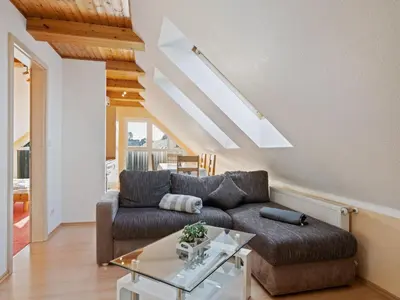 Ein Sitzbereich in der Unterkunft Attic Apartment with Garden Access