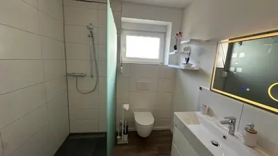 Ein Badezimmer in der Unterkunft Hansestube zentrale 3 Zimmer Ferienwohnung mit Terrasse 73m2