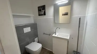 Ein Badezimmer in der Unterkunft Hansestube zentrale 3 Zimmer Ferienwohnung mit Terrasse 73m2