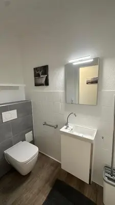 Ein Badezimmer in der Unterkunft Hansestube zentrale 3 Zimmer Ferienwohnung mit Terrasse 73m2