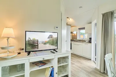 Küche/Küchenzeile in der Unterkunft Süsel Seeparx Ferienhaus Wellenkönig