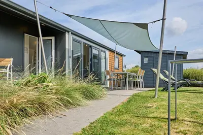Ein Garten an der Unterkunft Süsel Seeparx Ferienhaus Sonneninsel