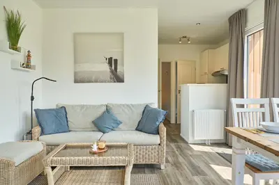 Ein Sitzbereich in der Unterkunft Süsel Seeparx Ferienhaus Biene
