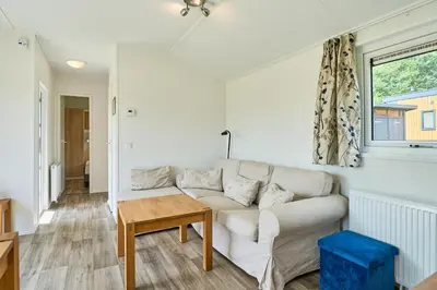Ein Sitzbereich in der Unterkunft Süsel Seeparx Ferienhaus Iona