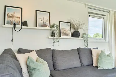 Ein Sitzbereich in der Unterkunft Süsel Seeparx Ferienhaus Haus am See