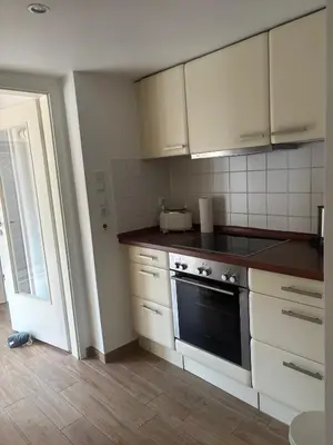 Küche/Küchenzeile in der Unterkunft Familienfreundliches Ferienhaus am Priwallstrand