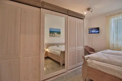 Ein Bett oder Betten in einem Zimmer der Unterkunft Ostsee-Domizil App 1