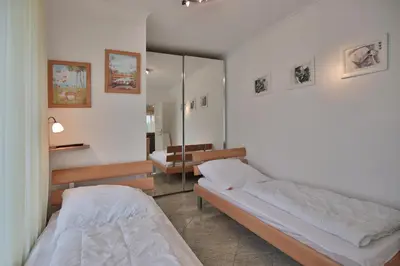 Ein Bett oder Betten in einem Zimmer der Unterkunft Ostsee-Domizil App 1