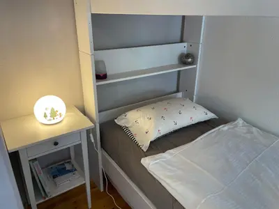 Ein Bett oder Betten in einem Zimmer der Unterkunft Ostseeferienwohnung Storchennest Zwei